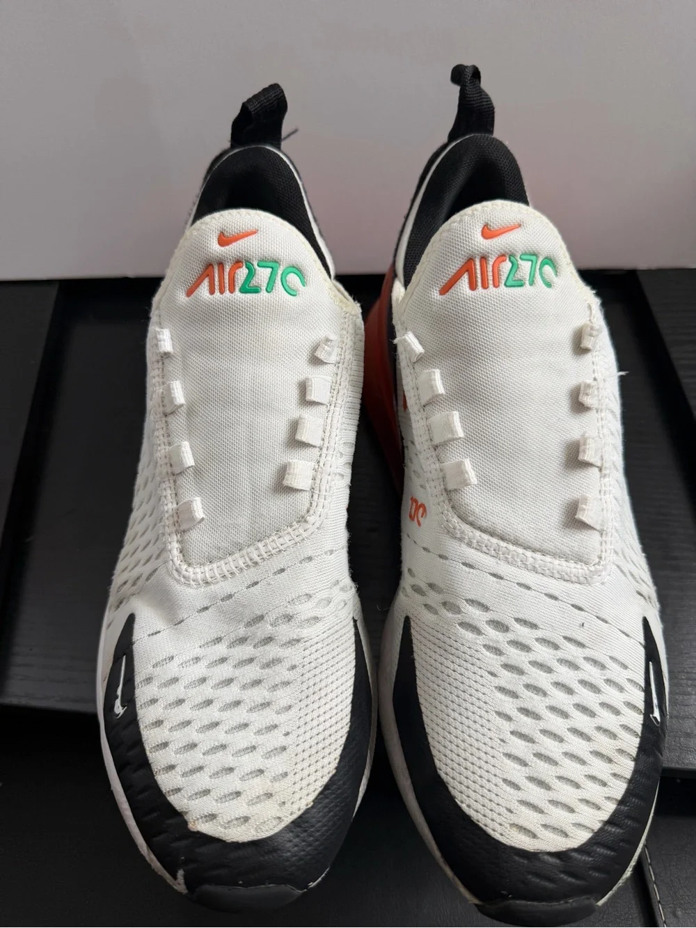 Nike Kids White Sneakers with Black, Orange and Green Accents
